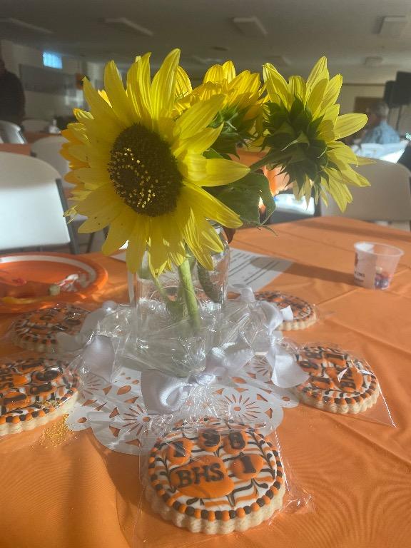 The flowers were the centerpieces, and the cookies were the party favors 